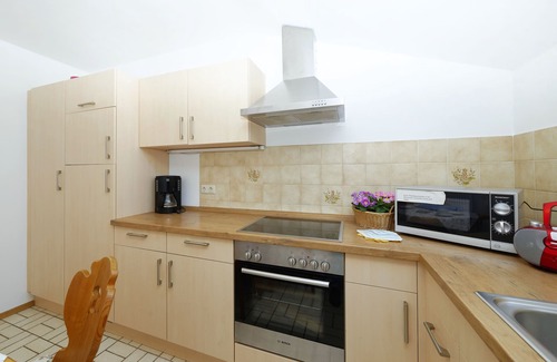 Aschau im Chiemgau Apartment | Vacation apartment I in the adjoining house, 65 sqm with separate bedroom, north-east facing balcony