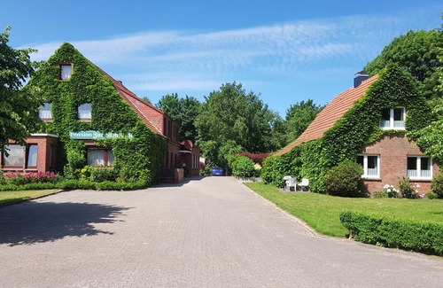 Dornumergrode Apartment | Vacation apartment directly on the North Sea with large garden and covered terrace