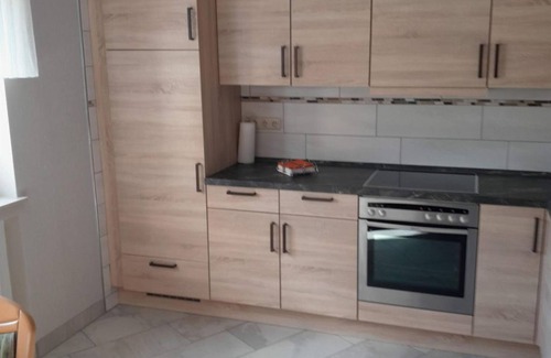 Altenkirchen Apartment | Vacation apartment with spacious sunbathing lawn - Ferienwohnung Hombitz