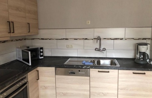 Altenkirchen Apartment | Vacation apartment with spacious sunbathing lawn long stay - Ferienwohnung Hombitz