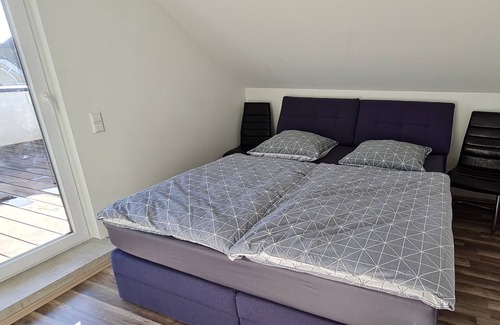 Ostringen Apartment | Vacation apartment "Penthouse Tiefenbach" with private wooden terrace on the roof and WLAN