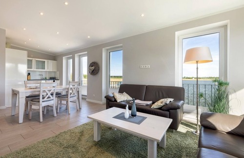 Puddemin Apartment | Vacation apartment Seeblick - Vacation at the natural harbor Puddemin