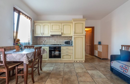 Sant'Antioco House | Vacation Home "Casa Vacanza L'Agave A" with Shared Terrace, A/C & Wi-Fi