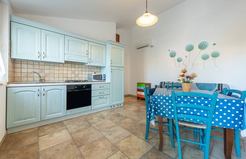 Sant'Antioco House | Vacation Home "Casa Vacanza L'Agave B" with Shared Terrace, Wi-Fi and Air Conditioning