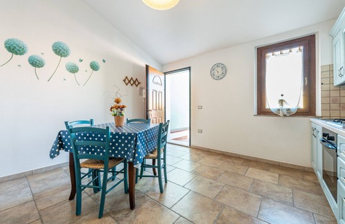 Sant'Antioco House | Vacation Home "Casa Vacanza L'Agave B" with Shared Terrace, Wi-Fi and Air Conditioning