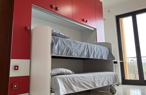 Torrenova Apartment | Vacation home with garden and parking space