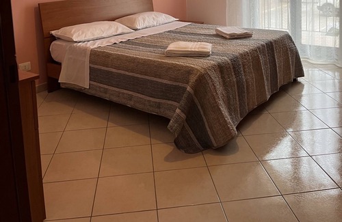 Torrenova Apartment | Vacation home with garden and parking space
