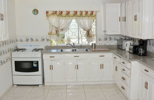 Paradise Acres Villa | Vacation Rental Near Doctors Cave Beach along the Hip Strip Montego Bay Jamaica