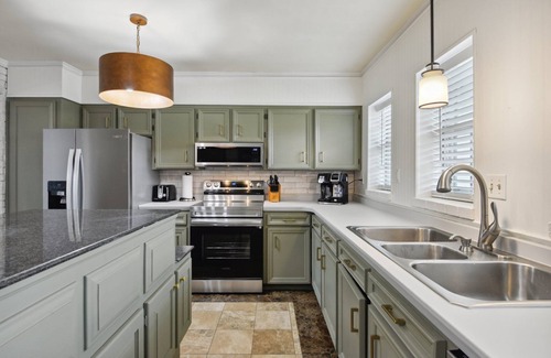 Gulfport House | Venetian Garden Retreat with Arcade Games & Hot Tub