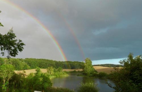 Warnitz Apartment | Villa am Trumpf - Design-Appartements im Naturgarten am See