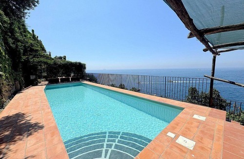 Furore Villa | Villa Babila: A charming two-story villa set into the cliff, sheer above the sea and with direct access to the sea, with Free WI-FI.