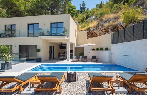 Borak Villa | Villa Casa Vita featuring a sea view, billiards, and heated pool