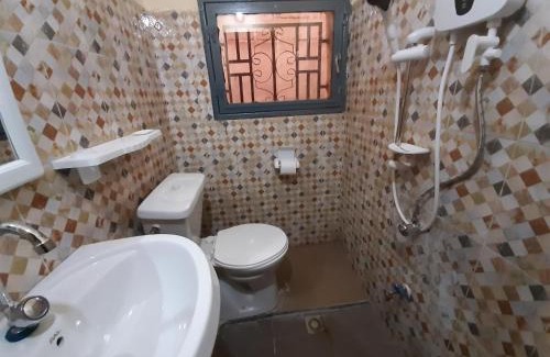 Bamako House | Villa Chambre C climatisée douche Cuisine salon