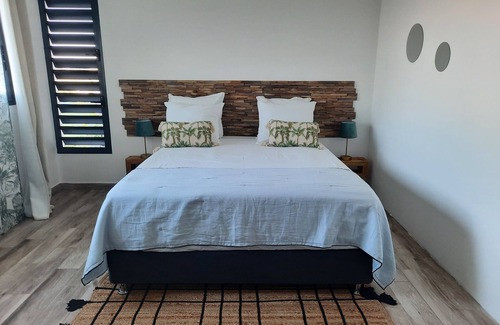 Grande Anse Bed & Breakfast | Villa Des Oliviers is a jewel nestled at the gateway to the wild south.