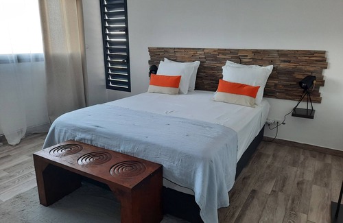 Grande Anse Bed & Breakfast | Villa Des Oliviers is a jewel nestled at the gateway to the wild south.