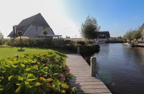 Delfstrahuizen Villa | Villa in Friesland with Sauna and Jetty