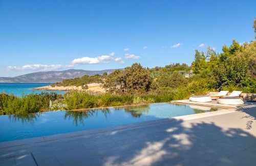 Kilada Villa | Villa Iris - Luxury traditional beachfront villa with swimming pool