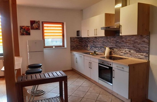 Kueps Condo | Villa Kunterbunt XXL, 150sqm furnished. Maisonette apartment with garden, sauna, 2 bathrooms