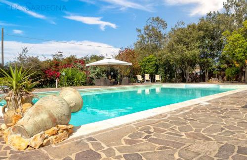 Porto Torres Villa | Villa Melograno with exclusive swimming pool surrounded by greenery