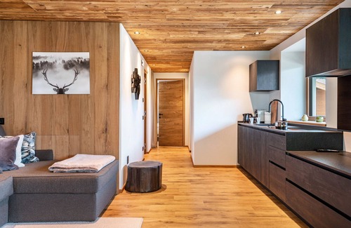 Selva di Val Gardena Apartment | Villa Sofia Apartment 'F' with Mountain View, Private Terrace and Wi-Fi