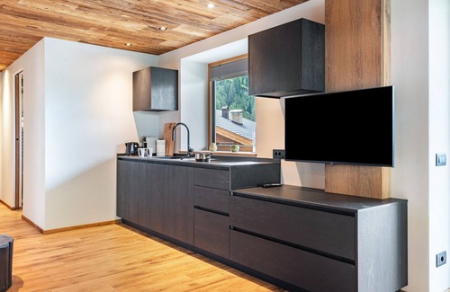 Selva di Val Gardena Apartment | Villa Sofia Apartment 'F' with Mountain View, Private Terrace and Wi-Fi