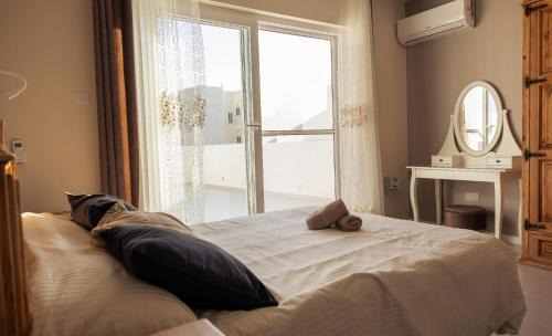 Birbuba Villa | Villa to rent in Gozo- Iż-Żerriegħa tal-Mustarda