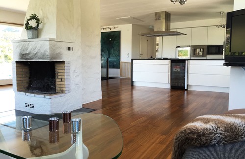 Nosund House | Villa with beautiful view over the bay, exciting mountains in the background