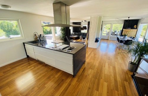Nosund House | Villa with beautiful view over the bay, exciting mountains in the background