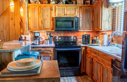 Houston County House | Vintage 1850's log house for rent with 185 acres ,on a Creek , 2miles trails .