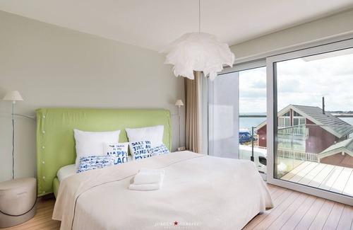 Kappeln Apartment | Vision: Luxurious apartment with wood-burning stove, Finnish sauna and Baltic Sea view