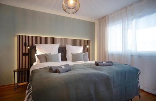 Kempten Apartment | VOYAGE Stadtoase am Fluss I Zentral I freier Parkplatz I Wifi I Netflix I Aufzug