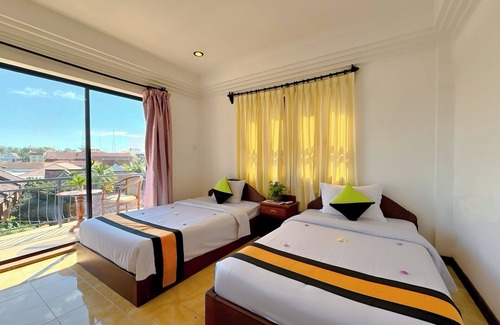 Taphul Village Area Hotel | Vplus Hotel – Budget-Friendly Room with WiFi & AC!