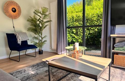 Ewijk House | Vrijstaande 6 persoons Bungalow hottub en pizzaoven op vakantiepark
