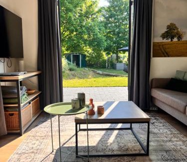 Ewijk House | Vrijstaande 6 persoons Bungalow hottub en pizzaoven op vakantiepark