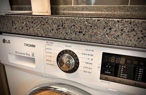 Songdo Apartment | W 2BR 60m2 Newly Built High Floor APT 2min to Hyundai Outlet Triple St 2Free Parking