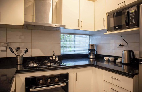 Petit Jean Ocharan Apartment | w* | Striking 1BR near Malecon in Miraflores