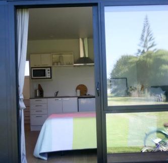 Wainui Apartment | Wainui Beach studio - 2 minutes walk to beach