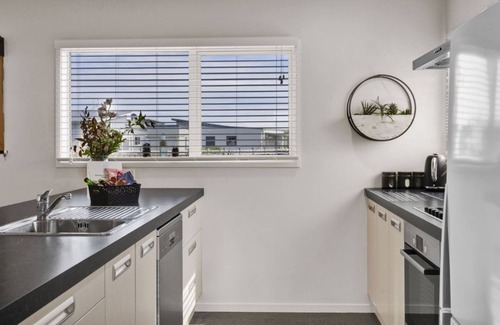 Waverley House | Waipipi Beach Retreat -nSunsets in the hot tub and strolls on the beach.