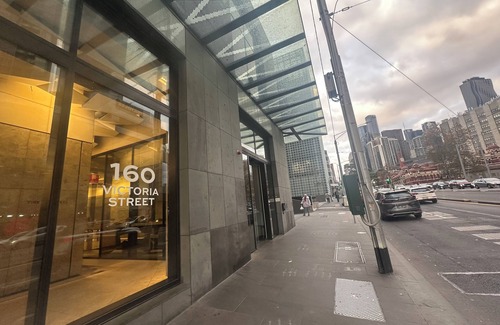 Carlton South Apartment | Walk through the art-filled lobby, and you'll find a full range of resident amenities, with pools and gym, neighbour to the world-renowned Royal Melbourne Institute of Technology (RMIT).