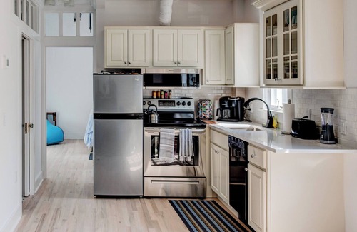 Westhampton Beach Apartment | Walk to everything from this ideally located Westhampton Beach condo with.