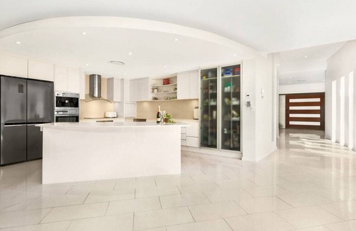 Pelican Waters House | Walk to Golf Course, Lagoon Pool, Coastal Lux Home
