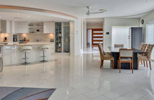 Pelican Waters House | Walk to Golf Course, Lagoon Pool, Coastal Lux Home