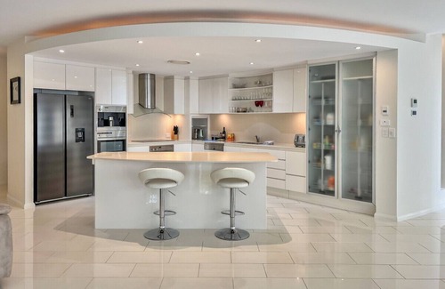 Pelican Waters House | Walk to Golf Course, Lagoon Pool, Coastal Lux Home