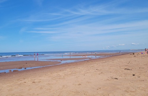 York Cottage | Walk to Stanhope Beach from our private 2 bedroom well equipped cottage.