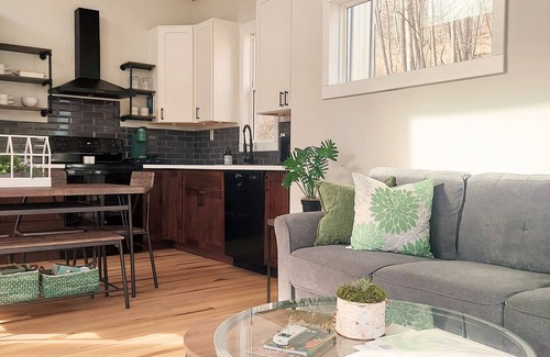 Chillicothe Cabin | Walk to State Park trails! Modern cabin surrounded by woods + hot tub + firepit