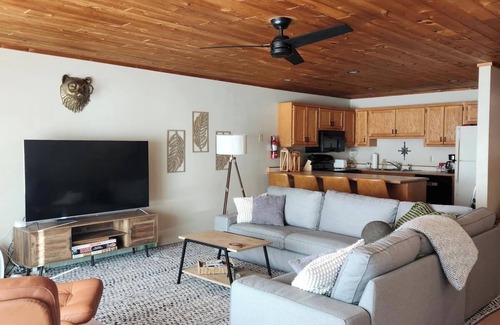 Two Harbors Condo | Water's Edge! Direct shoreline access; Condo with resort-like amenities