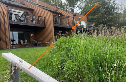 Two Harbors Condo | Water's Edge! Direct shoreline access; Condo with resort-like amenities