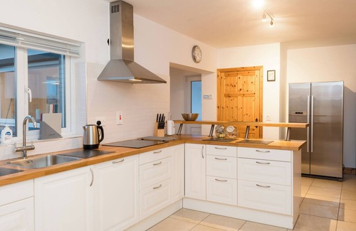 Carrigaholt House | Water's Edge - Loop Head Holiday Homes. Only a stone throw away from the water.