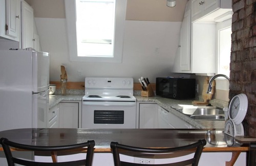 Wiscasset Condo | Water view from a luxury loft