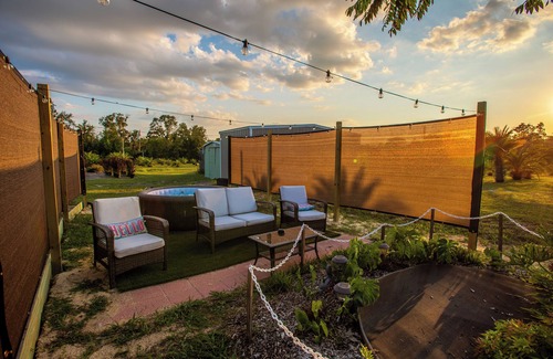 Sugarmill Woods Cabin | Waterfall Suite at Zen at the Palms with a Private Hot Tub by the Waterfall!